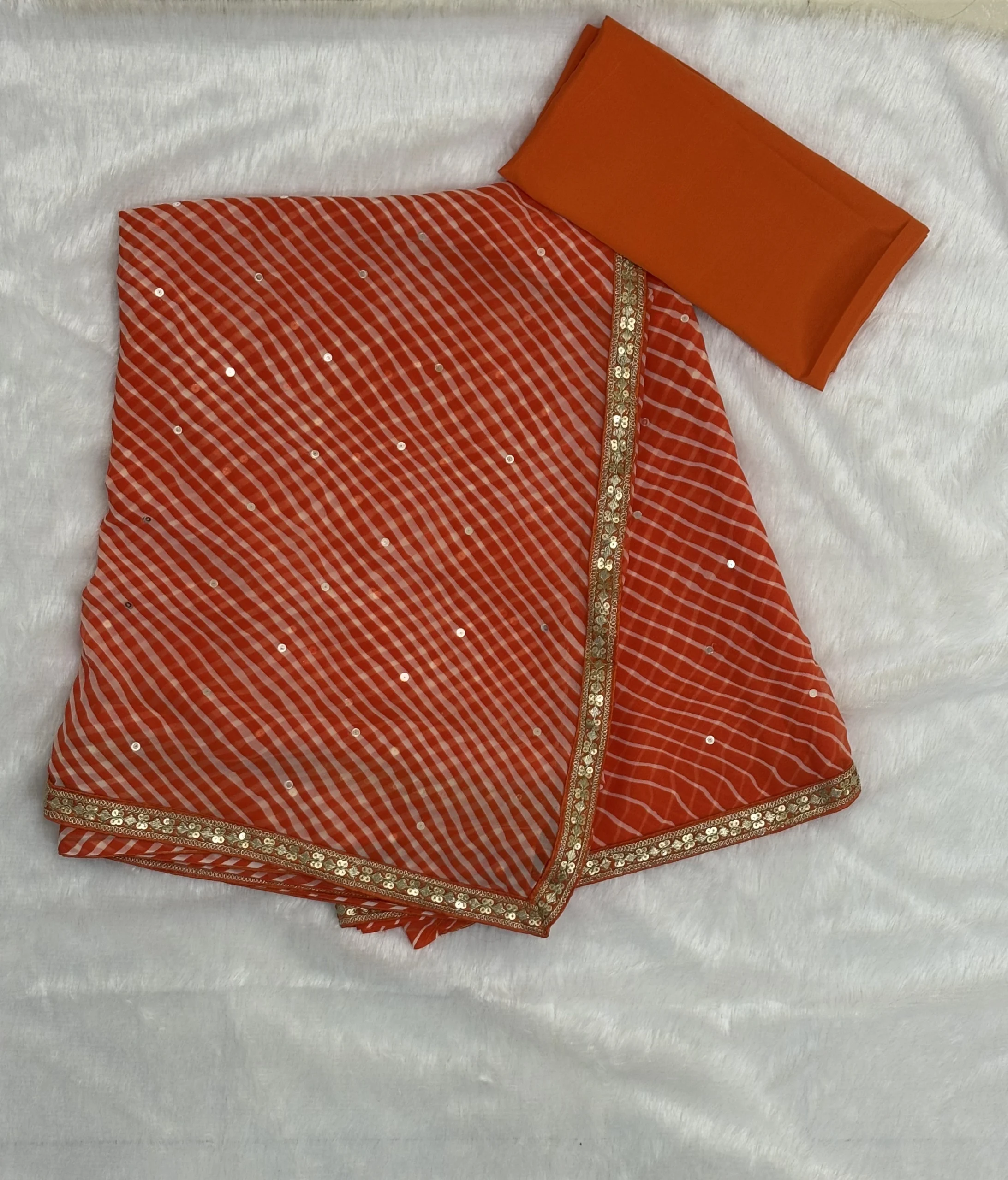 Tangerine Touch Orange Georgette Lehariya Saree